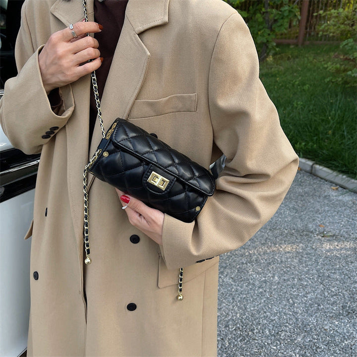 Cylindrisk vadderad väska