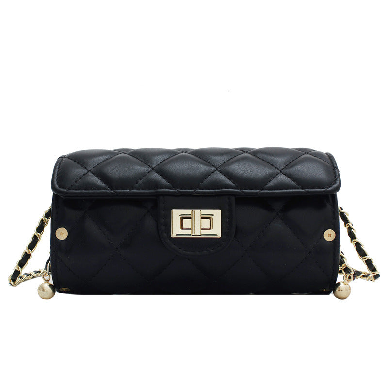 Cylindrisk vadderad väska